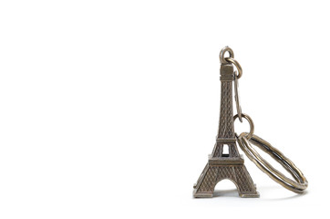 Eiffel tower model isolated on white background. Souvenir from capital city of France. Key ring.