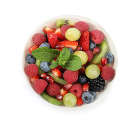 Fresh tasty fruit salad on white background, top view