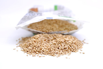 tahini seeds on white background