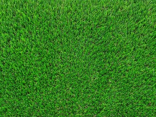 Fototapeta premium artificial green grass background texture