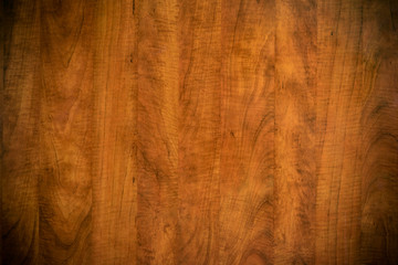 Brown dark scratched wooden cutting, chopping board. Wood texture.
