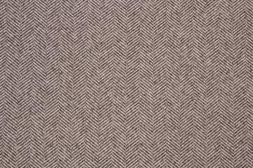 Cloth coats melange. The texture of the coat fabric close-up. 