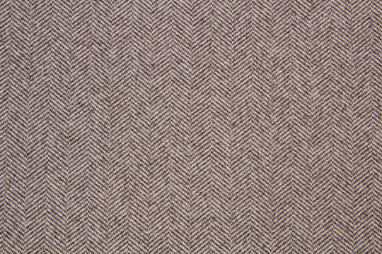 Cloth coats melange. The texture of the coat fabric close-up. 