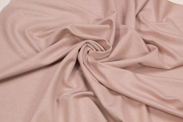 Fabric lurex beige. Shiny fabric texture