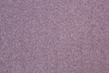 Cloth coats melange. The texture of the coat fabric close-up. 