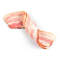 Rasher or smoked sliced bacon ready for cooking. Two pieces of pork belly isolated on white background, close-up.