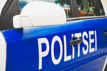 Estonian police car on the street. Close-up view.