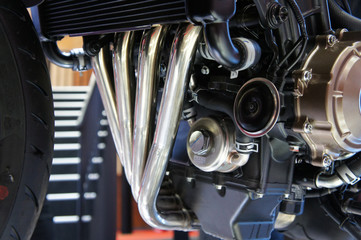 Selective focused on a high performance motorcycle engine. The engine is installed on a designed...