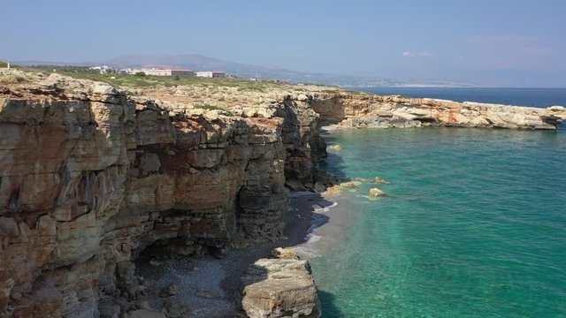 Aerial video on stone arch Kamara near Geropotamos beach on Crete, Greece.