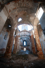 Fototapeta na wymiar Old ruined abandoned roman catholic church in Izyaslav