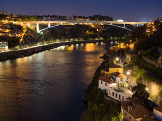 Ribeira district - historic center of Porto with Douro river and Porto cathedral in night (Porto, Portugal, Popular travel destination in Europe)