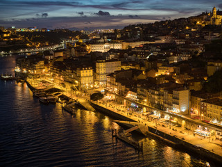 Ribeira district - historic center of Porto with Douro river and Porto cathedral in night (Porto, Portugal, Popular travel destination in Europe)