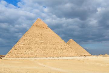 Fototapeta na wymiar The great pyramids in Giza plateau. Cairo, Egypt