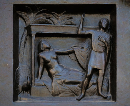 Thou shalt not commit adultery - Joseph and Potiphar's wife, relief on the door of the Grossmunster ("great minster") church in Zurich, Switzerland