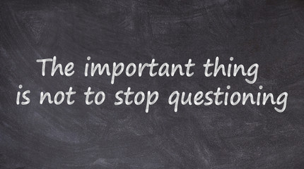 The important thing is not to stop questioning written on blackboard