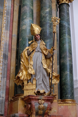 Statue of Saint, Altar in Collegiate church in Salzburg 