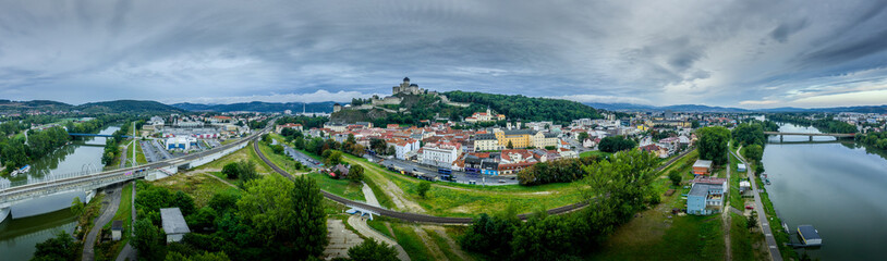 Aerial panorama of the Trencin Slovakia with the Vah river, bridges, castle, and medieval downtown