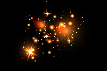 Set of gold glowing light effects isolated on dark background. Glow light effect. Star exploded sparkles.