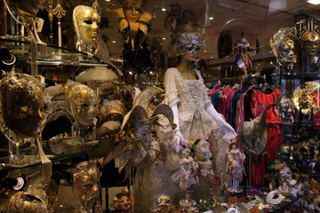 Traditional colorful masks in market at The carnival of Venice , Italy 