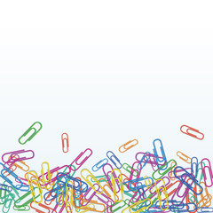 Heap of realistic colorful paper clips isolated on white background. Design element for banner, office or school supplies. Tools for education and work. Bottom border with copy space..