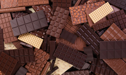 heap chocolate bar as a food background, confectionery cocoa product