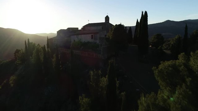 4K drone footage of small romanic hermitage of the 16th century in Gratallops,  a small town of Catalonia, at sunset