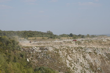 Kiev, Ukraine, Europe - September 2019: Landfill of building materials. Ecology, environmental pollution. Landfill waste. Garbage in the woods.