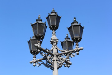 Fototapeta na wymiar vintage street lamp on a cloudless sky background