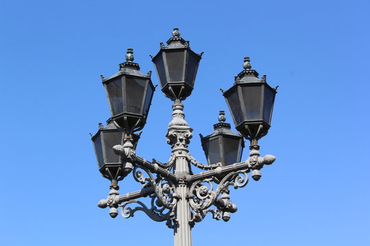 vintage street lamp on a cloudless sky background