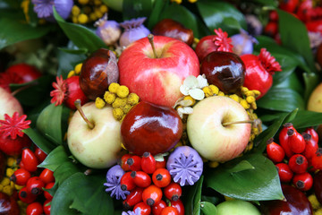 Fall arrangement with fruits and flowers