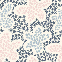 Cute floral background. Botanical seamless pattern made of small daisy flowers forming the flower petals. Simple colorful plain illustration.