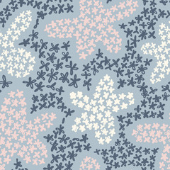 Cute floral background. Botanical seamless pattern made of small daisy flowers forming the flower petals. Simple colorful plain illustration.