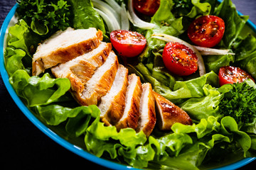 Caesar salad on stone table