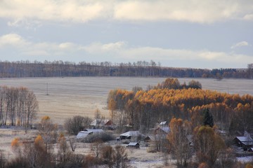 First snow at the fields of Nizhniy Novgorod region of Russia