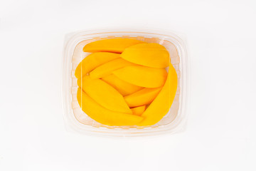 Mango Slices in a box isolated on white background