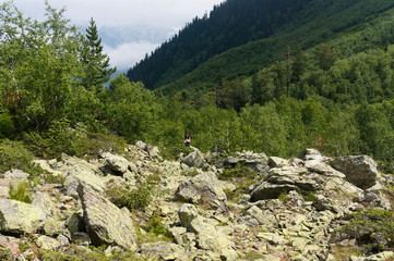 Mountain landscape, lake and mountain range. Dombay, northern caucasus, raw original