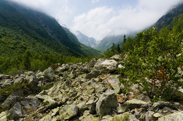 Mountain landscape, lake and mountain range. Dombay, northern caucasus, raw original