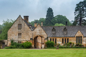 Plakat STANWAY, ENGLAND - MAY, 26 2018: Stanway Manor House built in Jacobean period architecture 1630 in guiting yellow stone, in the Cotswold village of Stanway, Gloucestershire, Cotswolds, UK 
