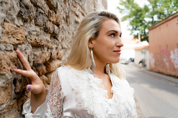 A bride's portrait in a old town