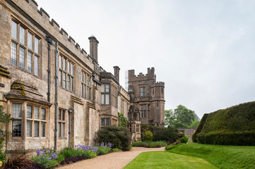SUDELEY CASTLE, WINCHCOMBE, GLOUCESTERSHIRE, ENGLAND - MAY, 26 2018: 16th century Sudeley Castle and its gardens in Winchcombe, Gloucestershire, Cotswolds, England