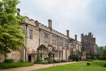 Fototapeta premium SUDELEY CASTLE, WINCHCOMBE, GLOUCESTERSHIRE, ENGLAND - MAY, 26 2018: 16th century Sudeley Castle and its gardens in Winchcombe, Gloucestershire, Cotswolds, England