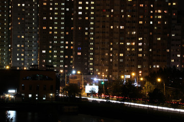 Fototapeta na wymiar Beautiful city view and traffic lights at night