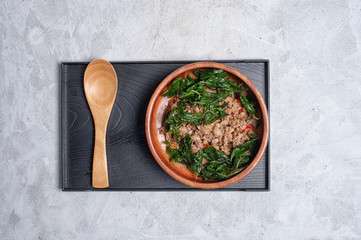Thai Food stir fried pork with basil Cook by order