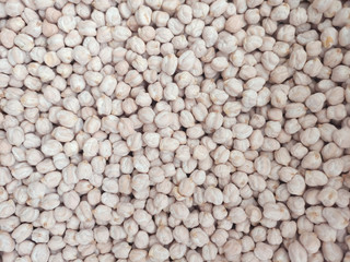 dried chickpea as background. Closeup uncooked chickpea top view Vegan healthy nutrition