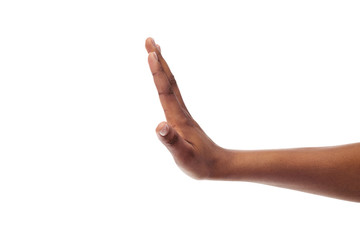 Black female hand showing stop gesture, isolated on white background