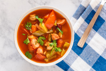 Letcho with yellow and red pepper, zucchini, tomatoes and mushrooms served in a bowl