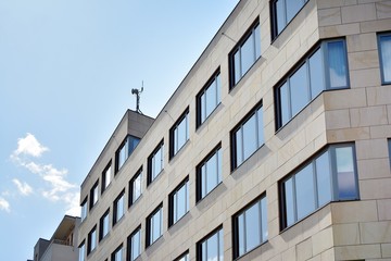 The windows of a modern building for offices. Business buildings architecture.