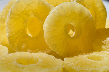 Pineapple rings sliced. Dried pineapple candy rings, close-up.