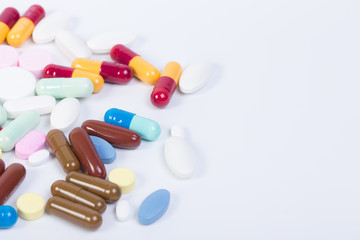 a lot of pills medicine isolated on white background