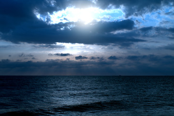 sky and sea,water,blue,clouds,sun,light,sunrise,cloudscape,nature,horizon,